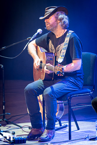 Tom Moriarty on guitar & vocals