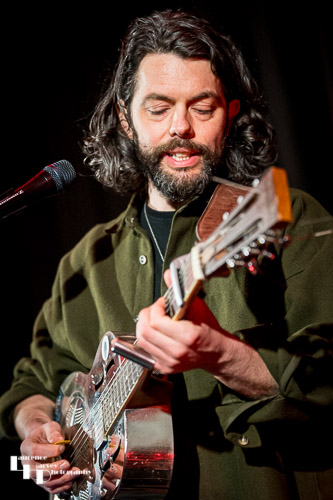 James Cameron on vocals & guitar
