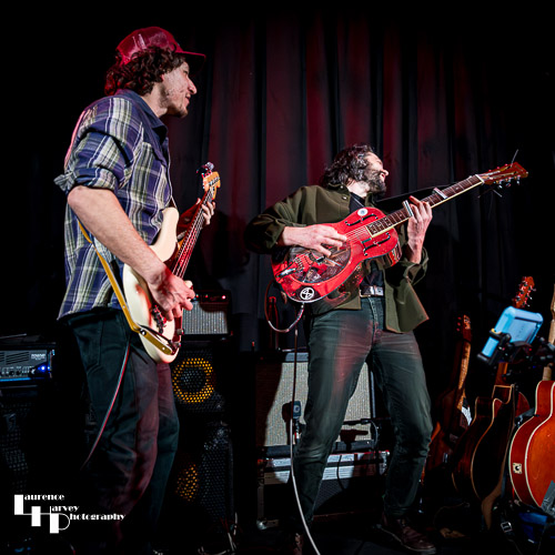 James Cameron on vocals & guitar, Joseph James on vocals & bass