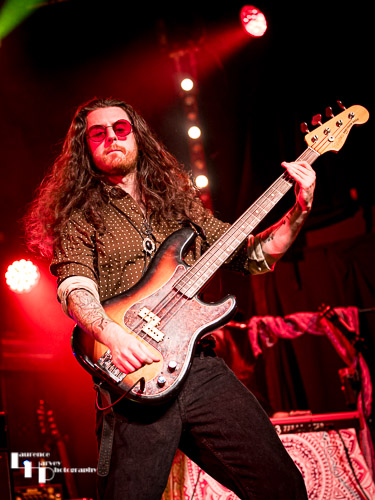 Adam Brewell on bass