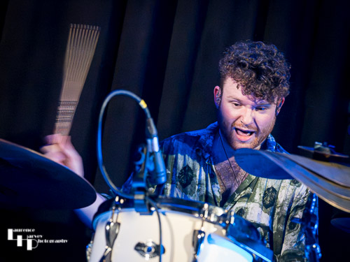 Zac O'Loughlin on drums