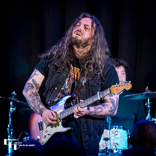 Aiden Pryor on guitar & vocals