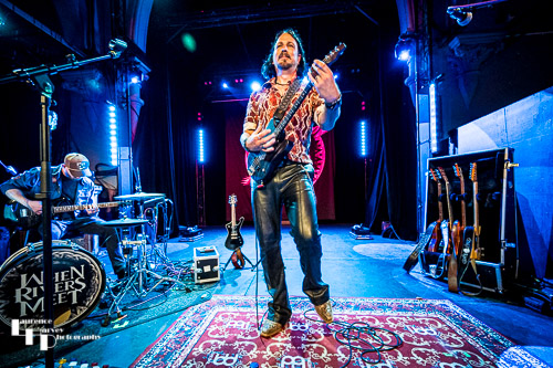 Aaron Bond on guitar & vocals