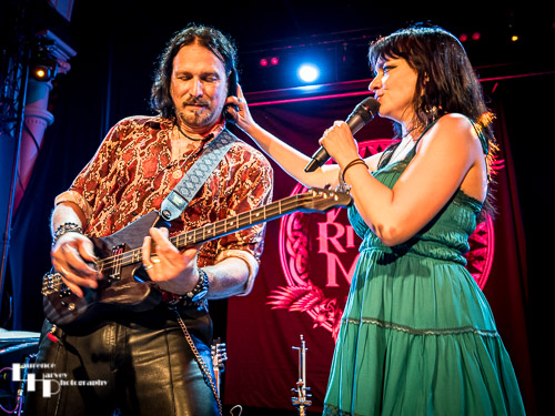 Grace Bond on vocals, Aaron Bond on guitar