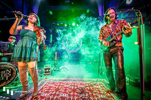 Grace Bond on vocals, Aaron Bond on guitar
