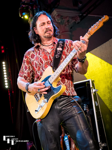 Aaron Bond on guitar & vocals