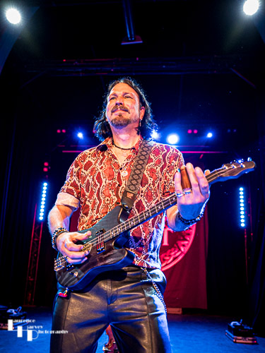 Aaron Bond on guitar & vocals