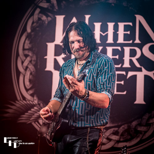Aaron Bond on guitar & vocals