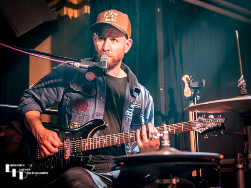 James Fox on percussion, guitar & backing vocals