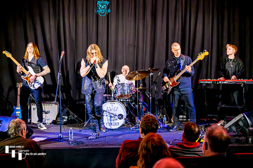 Will Wilde & his band on stage at The John Peel Centre