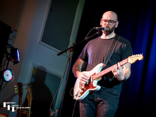 Paul Turley on vocals and guitar