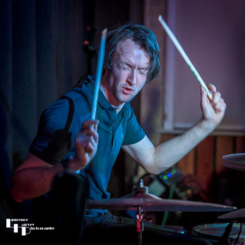Phil Wilson on drums