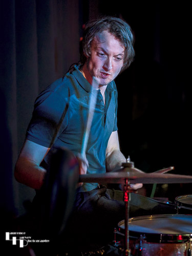 Phil Wilson on drums