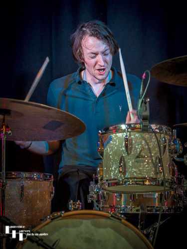 Phil Wilson on drums