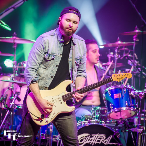 Louis Malagodi on guitar