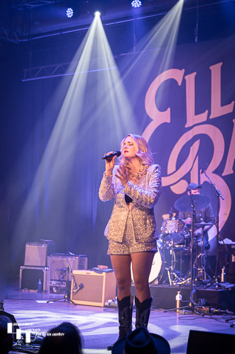 Elles Bailey on stage at The Apex