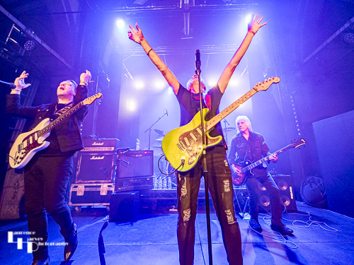 Steve Overland on vocals & guitar, Jim Kirkpatrick on guitar, Merv Goldsworthy on bass