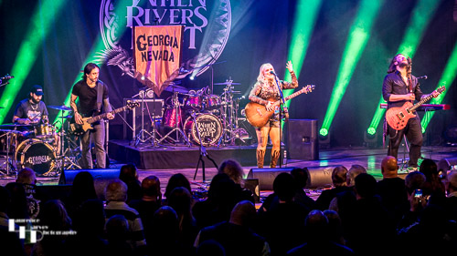 Georgia Nevada & her band on stage at The Apex