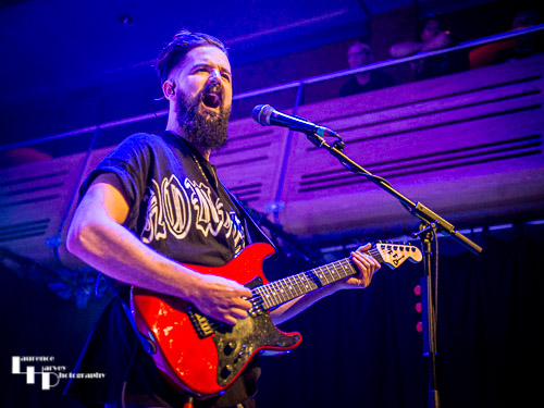 Josiah J Manning on guitar & vocals