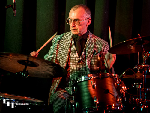 Mike Roberts on drums