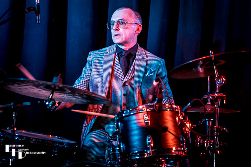 Mike Roberts on drums