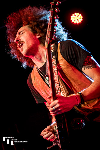 Henry James (Schneekluth) on backing vocals & guitar