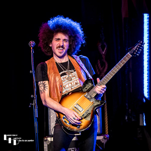 Henry James (Schneekluth) on backing vocals & guitar