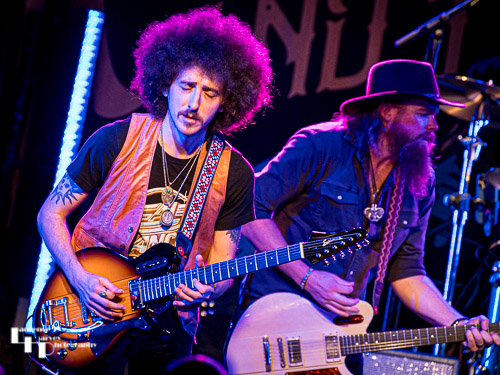 Henry James (Schneekluth) on backing vocals & guitar