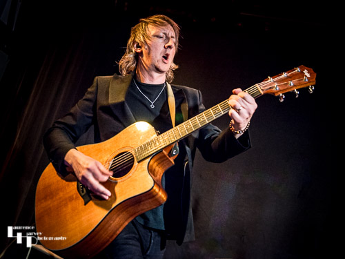 Ash Wilson on guitar