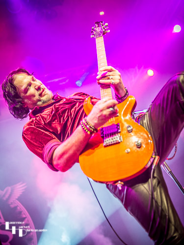 Aaron Bond on guitar & vocals