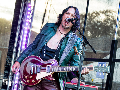 Aaron Bond on guitar & vocals