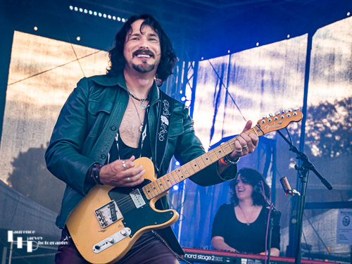 Aaron Bond on guitar & vocals