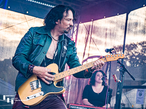 Aaron Bond on guitar & vocals