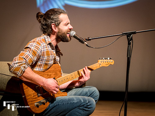 Adam Bowers on guitar & backing vocals