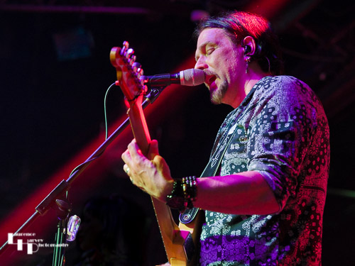 Aaron Bond on guitar & vocals