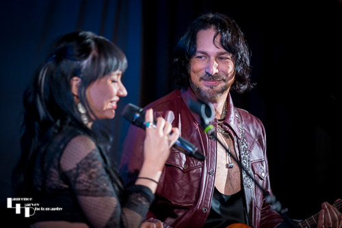 Grace Bond on vocals, Aaron Bond on guitar & vocals