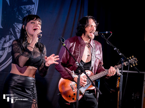 Grace Bond on vocals, Aaron Bond on guitar & vocals