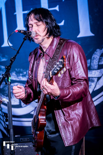 Aaron Bond on guitar & vocals