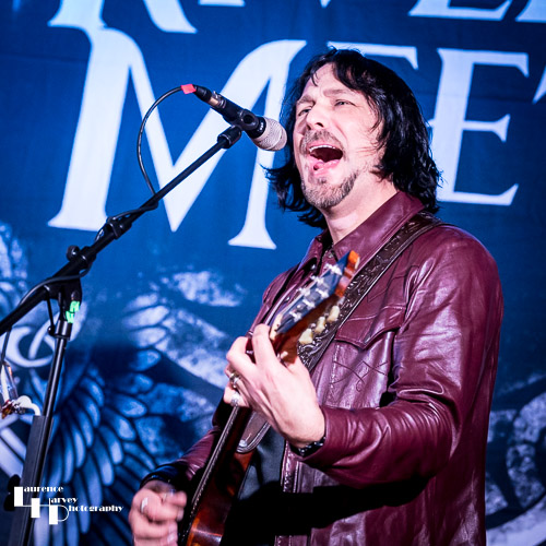 Aaron Bond on guitar & vocals