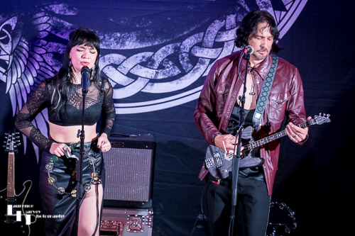 Grace Bond on tamborine & vocals, Aaron Bond on guitar & vocals