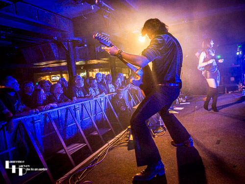 Aaron Bond on guitar & vocals