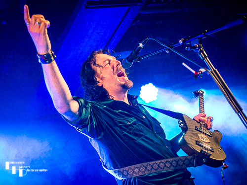 Aaron Bond on guitar & vocals