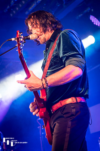 Aaron Bond on guitar & vocals