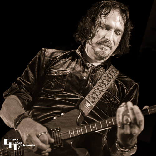 Aaron Bond on guitar & vocals