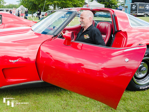 Red Corvette with owner