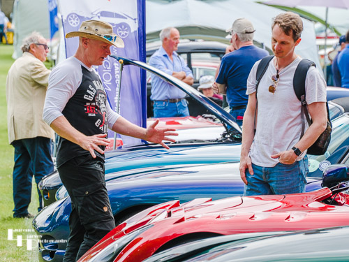 Owner & punter chatting about red TVR
