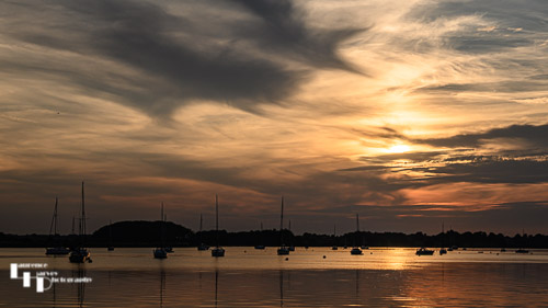 Setting sun over the River Deben at Ramsholt