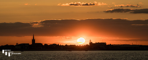 View across estuary at sunset towards Harwich